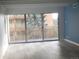 Living room with sliding doors to balcony and hardwood floors at 8060 E Girard Ave # 601, Denver, CO 80231