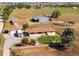 Aerial view of a ranch house on a large lot with outbuildings at 1637 S Us Highway 287, Berthoud, CO 80513