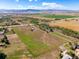 Aerial view of property with mountain views at 1637 S Us Highway 287, Berthoud, CO 80513