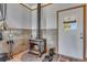 Laundry area with wood-burning stove at 1637 S Us Highway 287, Berthoud, CO 80513