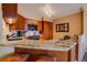 Granite countertops, modern appliances, and ample cabinetry in this updated kitchen at 1625 Larimer St # 904, Denver, CO 80202