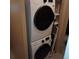 Stackable Samsung washer and dryer in laundry closet at 1625 Larimer St # 904, Denver, CO 80202