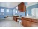 Spa-like bathroom with double vanity, soaking tub, and separate shower at 5033 Silver Feather Way, Broomfield, CO 80023