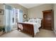 Charming bedroom with bookcase and natural light at 5033 Silver Feather Way, Broomfield, CO 80023