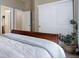 Bedroom with large closet and access to bathroom at 5033 Silver Feather Way, Broomfield, CO 80023