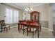 Formal dining room showcasing a wood table, chairs, and built-in hutch at 5033 Silver Feather Way, Broomfield, CO 80023