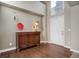 Elegant entryway with hardwood floors, a console table, and a large window at 5033 Silver Feather Way, Broomfield, CO 80023