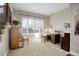 Home office with built-in desk and plantation shutters at 5033 Silver Feather Way, Broomfield, CO 80023