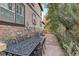 Patio with wrought iron table and chairs, next to the house at 5033 Silver Feather Way, Broomfield, CO 80023