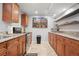 Well-equipped basement kitchen features granite countertops and ample cabinetry at 9560 W 38Th Ave, Wheat Ridge, CO 80033