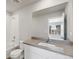 Clean bathroom with a vanity, toilet, and bathtub at 2971 Pershing St, Strasburg, CO 80136