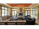 Inviting community room with comfortable seating, fireplace, and large windows at 3230 Boulder Cir # 101, Broomfield, CO 80023