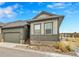 Modern two-story home with attached garage and landscaped front yard at 11865 Barrentine Loop, Parker, CO 80138