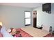 Bright bedroom with large window and built-in dresser at 2815 S Locust St # F, Denver, CO 80222