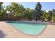 Community pool with plenty of lounge chairs and umbrellas at 2815 S Locust St # F, Denver, CO 80222