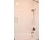 Clean bathroom with a shower/tub combo and updated fixtures at 2815 S Locust St # F, Denver, CO 80222