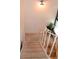 Carpeted staircase with simple white railing at 2815 S Locust St # F, Denver, CO 80222