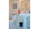 Clean bathroom featuring pedestal sink and toilet at 2815 S Locust St # F, Denver, CO 80222