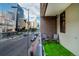 Private balcony with city views and seating for two at 1020 15Th St # 214, Denver, CO 80202