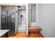 Modern bathroom with walk-in shower and glass block window at 1020 15Th St # 214, Denver, CO 80202