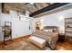 Spacious main bedroom with hardwood floors and built-in shelves at 1020 15Th St # 214, Denver, CO 80202