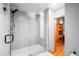 Clean bathroom with a walk-in shower and glass enclosure at 1020 15Th St # 214, Denver, CO 80202