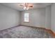 Simple bedroom with carpet and a window at 1699 S Trenton St # 77, Denver, CO 80231