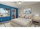 Bright bedroom with neutral decor and large bed at 16 Whitehaven Cir, Highlands Ranch, CO 80129