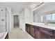 Double vanity bathroom with shower and tub at 207 S Irvington St, Aurora, CO 80018