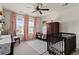 Well-lit bedroom with two twin beds and plenty of storage at 2614 Hillcroft Ln, Castle Rock, CO 80104