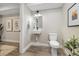 Contemporary powder room with floating sink and modern toilet at 3830 Jason St # 4, Denver, CO 80211