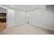 Finished basement bedroom with access to kitchen and full bathroom at 6690 S Sheridan Blvd, Littleton, CO 80123