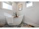 Relaxing bathroom featuring a freestanding soaking tub at 6690 S Sheridan Blvd, Littleton, CO 80123