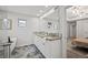 Modern bathroom with double vanity and large soaking tub at 6690 S Sheridan Blvd, Littleton, CO 80123