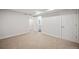 Spacious carpeted bedroom with an ensuite bathroom at 6690 S Sheridan Blvd, Littleton, CO 80123