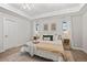 Bright bedroom with neutral decor and double closets at 6690 S Sheridan Blvd, Littleton, CO 80123