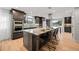Modern kitchen with granite countertops and island at 6690 S Sheridan Blvd, Littleton, CO 80123