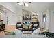 Bright living room with fireplace and access to backyard at 6690 S Sheridan Blvd, Littleton, CO 80123