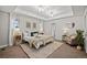 Large main bedroom with plush carpet and ample natural light at 6690 S Sheridan Blvd, Littleton, CO 80123