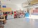 Well-organized garage with ample storage and workbench at 8547 Gold Peak Dr # G, Highlands Ranch, CO 80130