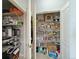 Well-organized pantry with ample shelving for storage at 8547 Gold Peak Dr # G, Highlands Ranch, CO 80130