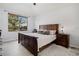 Spacious bedroom with a king-size bed and a view at 8547 Gold Peak Dr # G, Highlands Ranch, CO 80130
