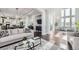 Open concept kitchen and living room with hardwood floors at 7587 Wright Ct, Arvada, CO 80005