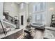 Bright living room with hardwood floors and high ceilings at 7587 Wright Ct, Arvada, CO 80005