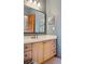 Well-appointed bathroom with a single vanity and updated fixtures at 12421 High Country Trl, Littleton, CO 80127