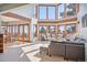 Spacious living room with large windows and mountain views at 12421 High Country Trl, Littleton, CO 80127