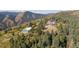 Mountaintop home with detached garage; expansive views at 12421 High Country Trl, Littleton, CO 80127