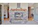 Stone fireplace with a modern design in the living room at 12421 High Country Trl, Littleton, CO 80127