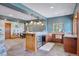 Basement wet bar with wine cooler and cabinetry at 12421 High Country Trl, Littleton, CO 80127
