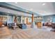 Finished basement with a large living area, wet bar, and game area at 12421 High Country Trl, Littleton, CO 80127